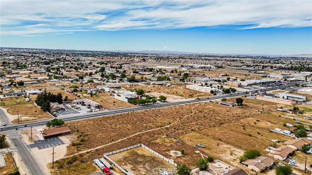 11695 Hesperia Road Hesperia, CA 92345 - Photo 12 of 31 an aerial view of residential houses with outdoor space