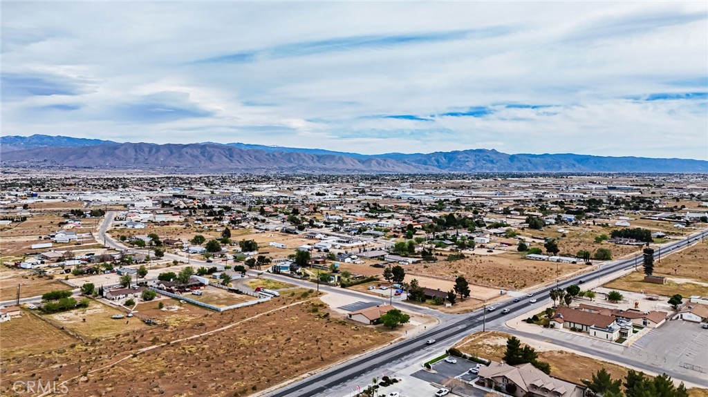 11695 Hesperia Road Hesperia, CA 92345 - Photo 18 of 31 an aerial view of residential building and street