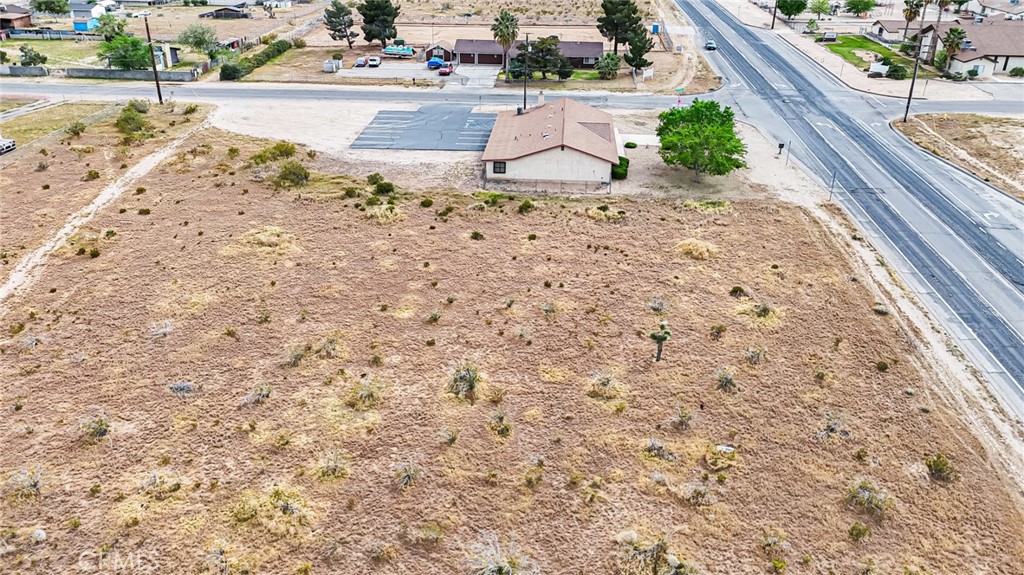 11695 Hesperia Road Hesperia, CA 92345 - Photo 21 of 31 a view of a backyard of a house
