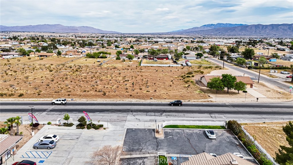 11695 Hesperia Road Hesperia, CA 92345 - Photo 3 of 31 a view of a city with an outdoor seating