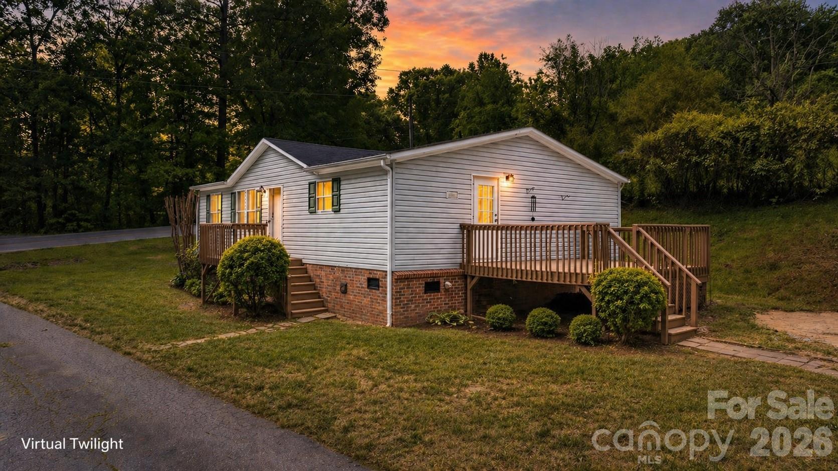 3536 Nelson Lane Morganton, NC 28655 - Photo 1 of 33 a view of a house with a yard and a large tree