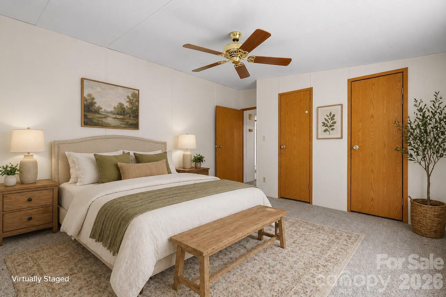 3536 Nelson Lane Morganton, NC 28655 - Photo 16 of 33 a bedroom with a bed and a chandelier