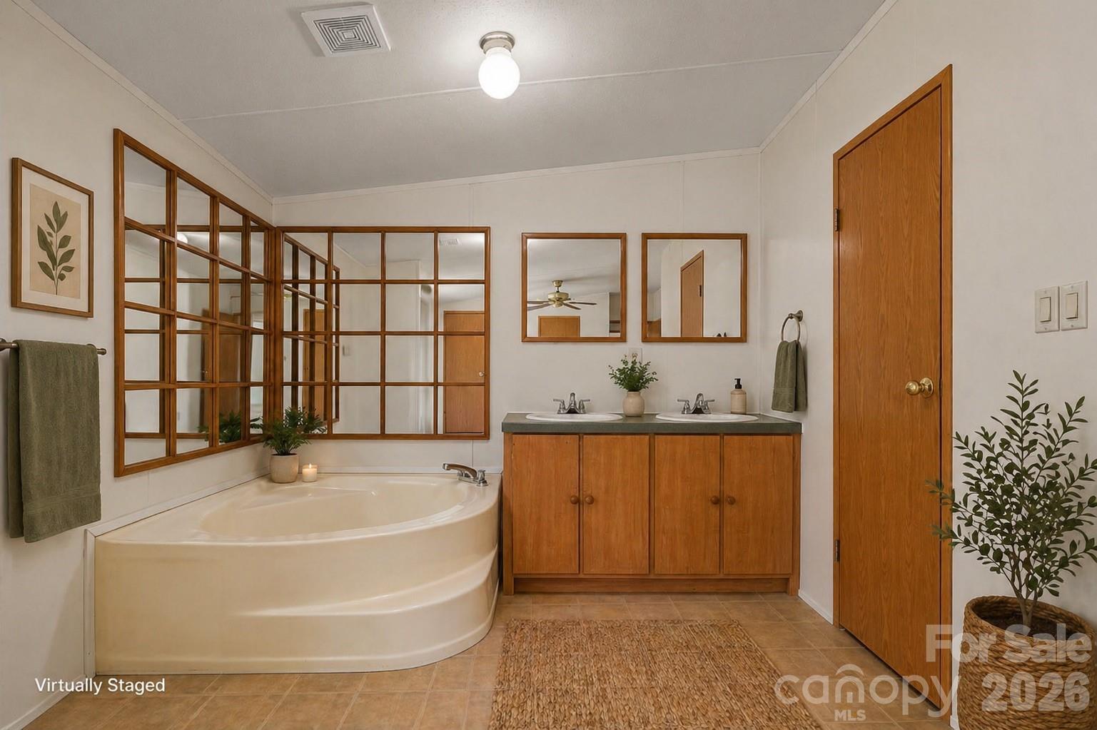 3536 Nelson Lane Morganton, NC 28655 - Photo 18 of 33 a bathroom with a tub sink and mirror