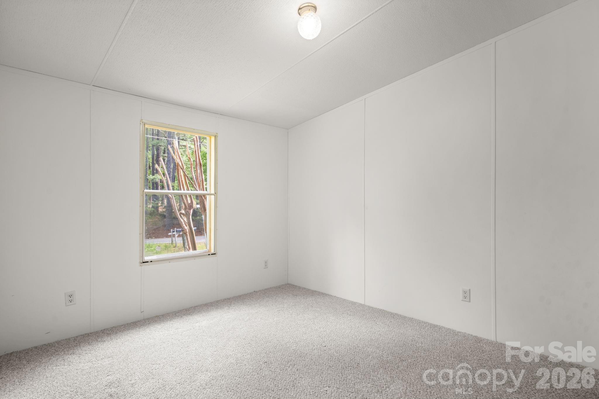 3536 Nelson Lane Morganton, NC 28655 - Photo 24 of 33 an empty room with a window