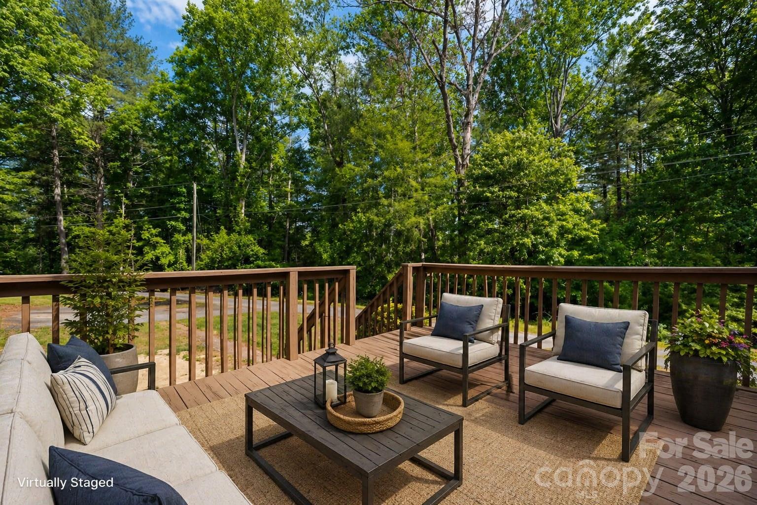 3536 Nelson Lane Morganton, NC 28655 - Photo 3 of 33 a view of a patio with couches chairs and a wooden floor
