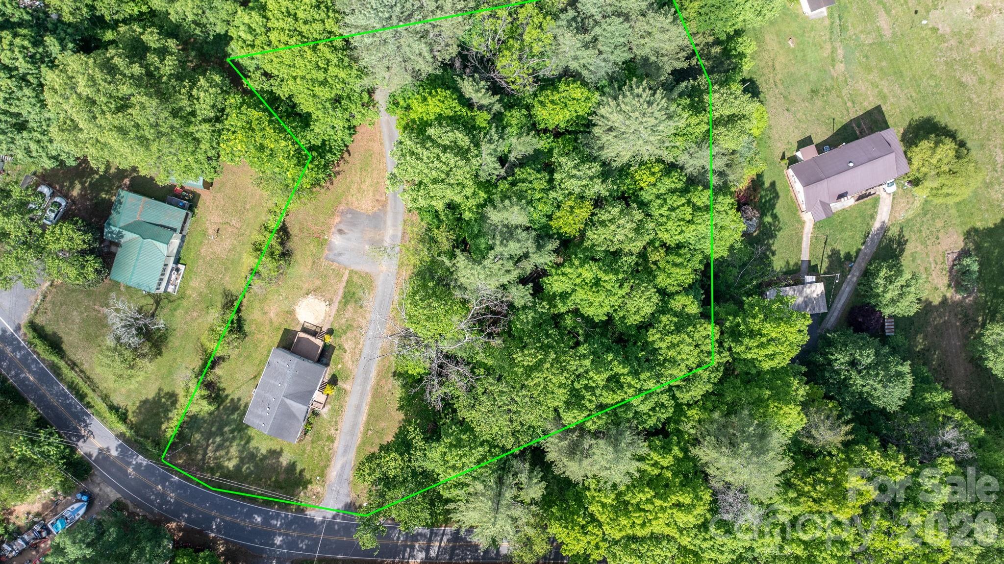 3536 Nelson Lane Morganton, NC 28655 - Photo 5 of 33 an aerial view of residential house with outdoor space and trees all around