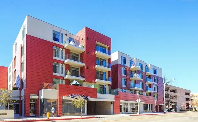 a front view of multi story residential apartment building