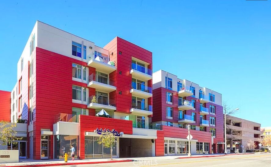 a front view of multi story residential apartment building