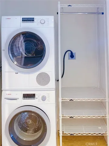 a close view of a sink and a washer dryer