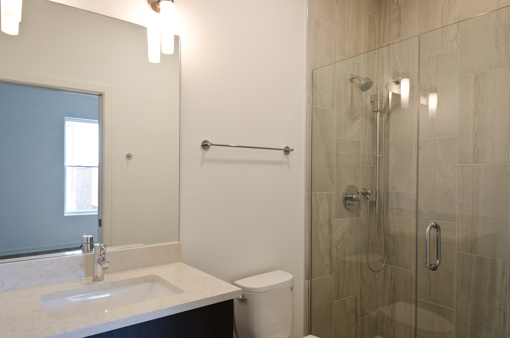 Undisclosed Address Chicago, IL 60642 - Photo 12 of 14 a bathroom with a sink and a mirror