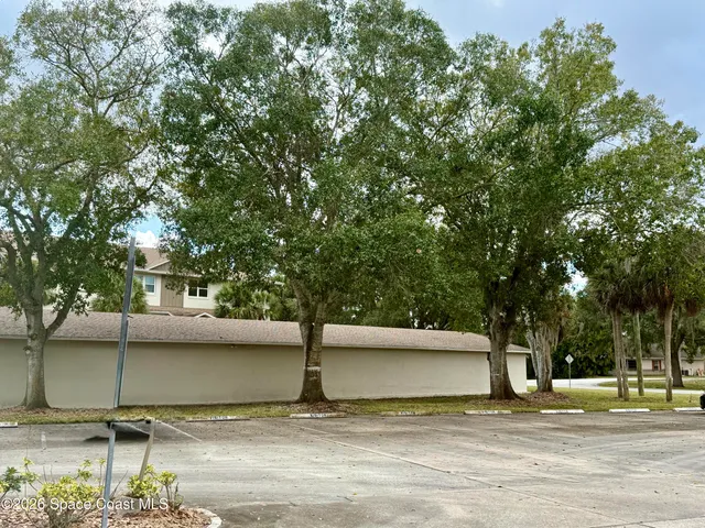 a view of road with trees
