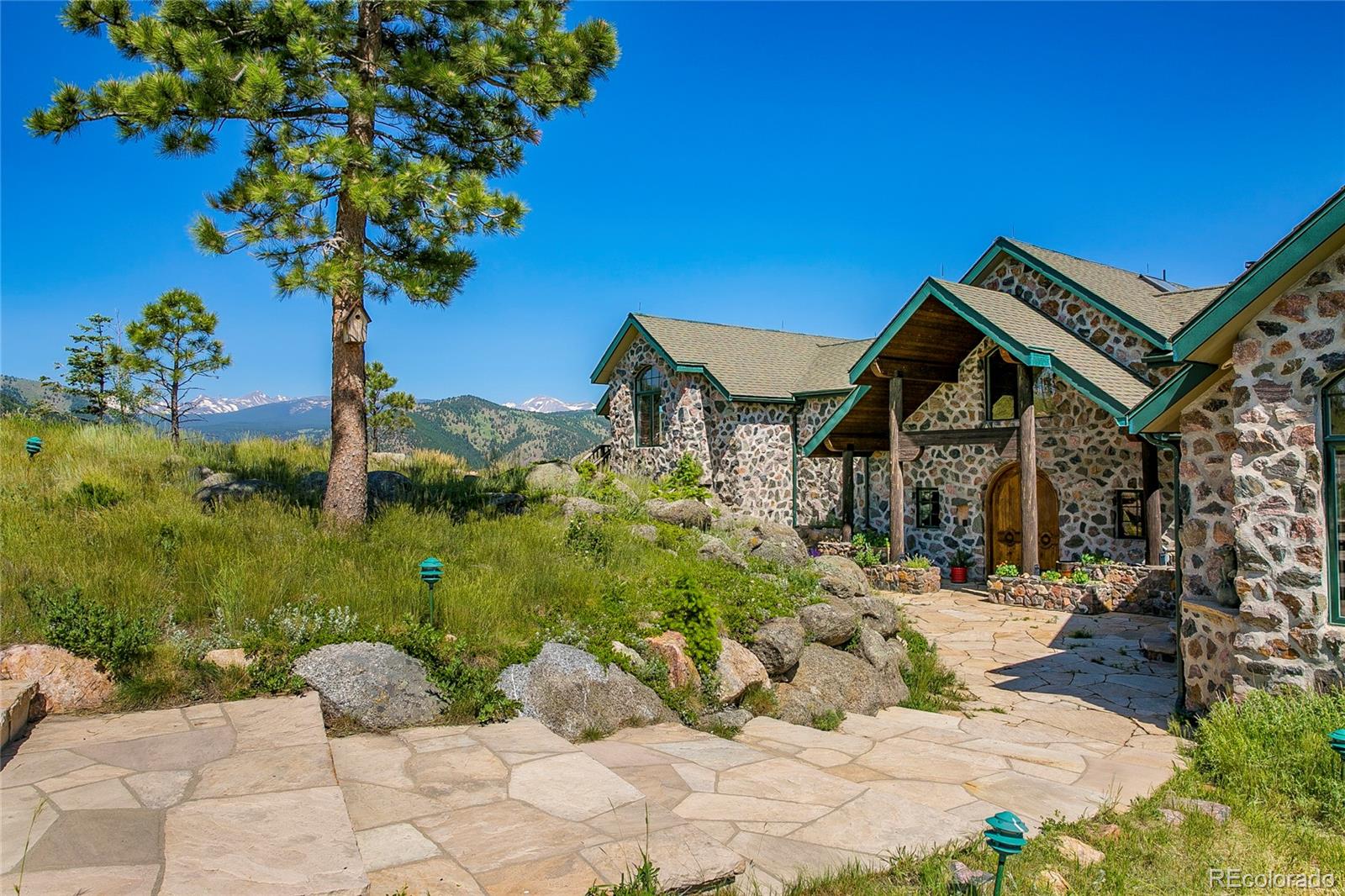 355 Mountain King Road Boulder, CO 80302 - Photo 1 of 33 a view of a house with a yard