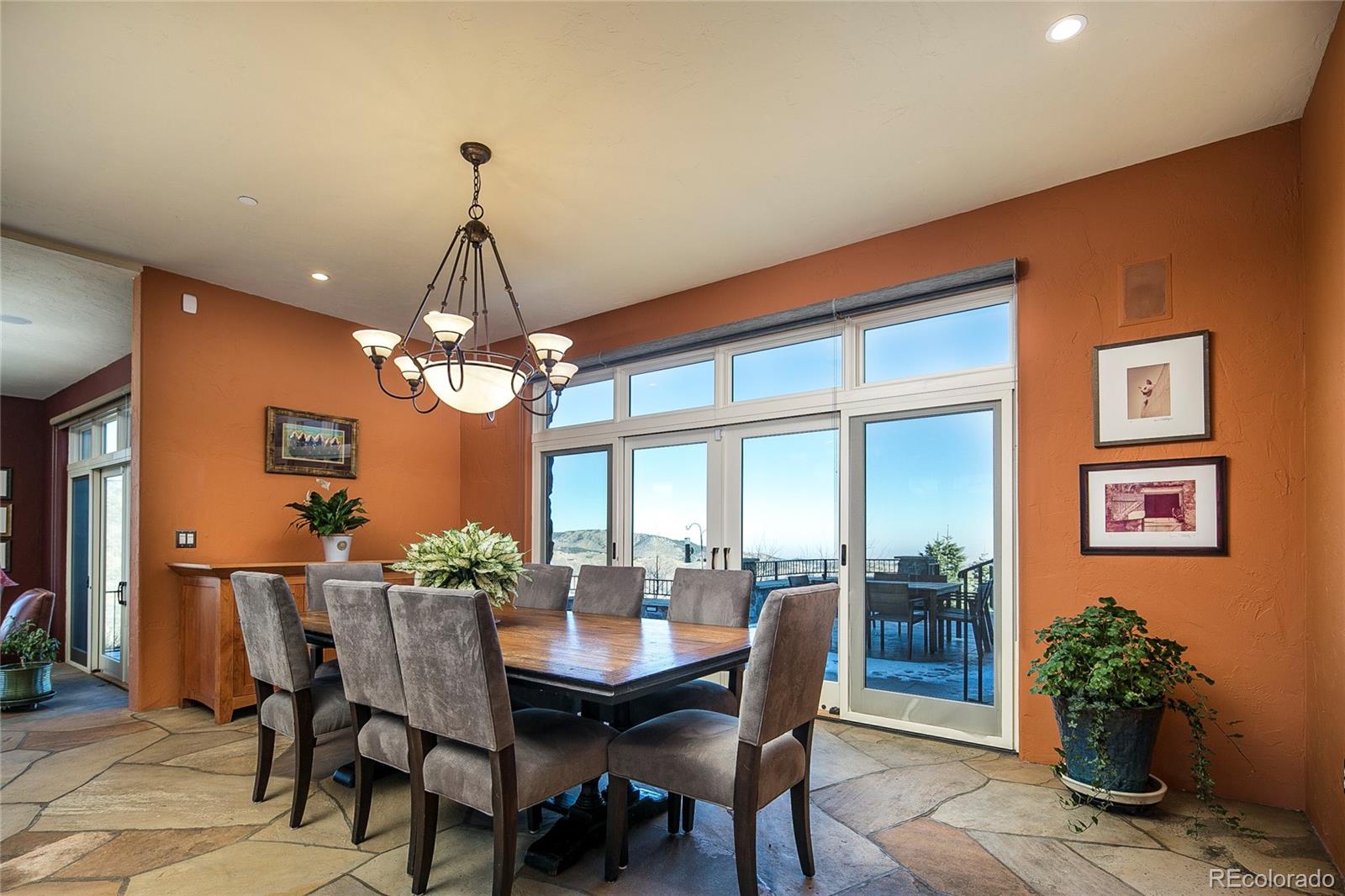 355 Mountain King Road Boulder, CO 80302 - Photo 11 of 33 a view of a dining room with furniture window and wooden floor