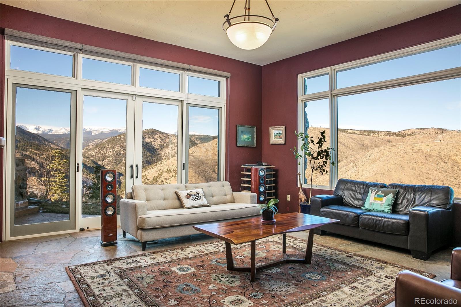355 Mountain King Road Boulder, CO 80302 - Photo 13 of 33 a living room with furniture and a large window
