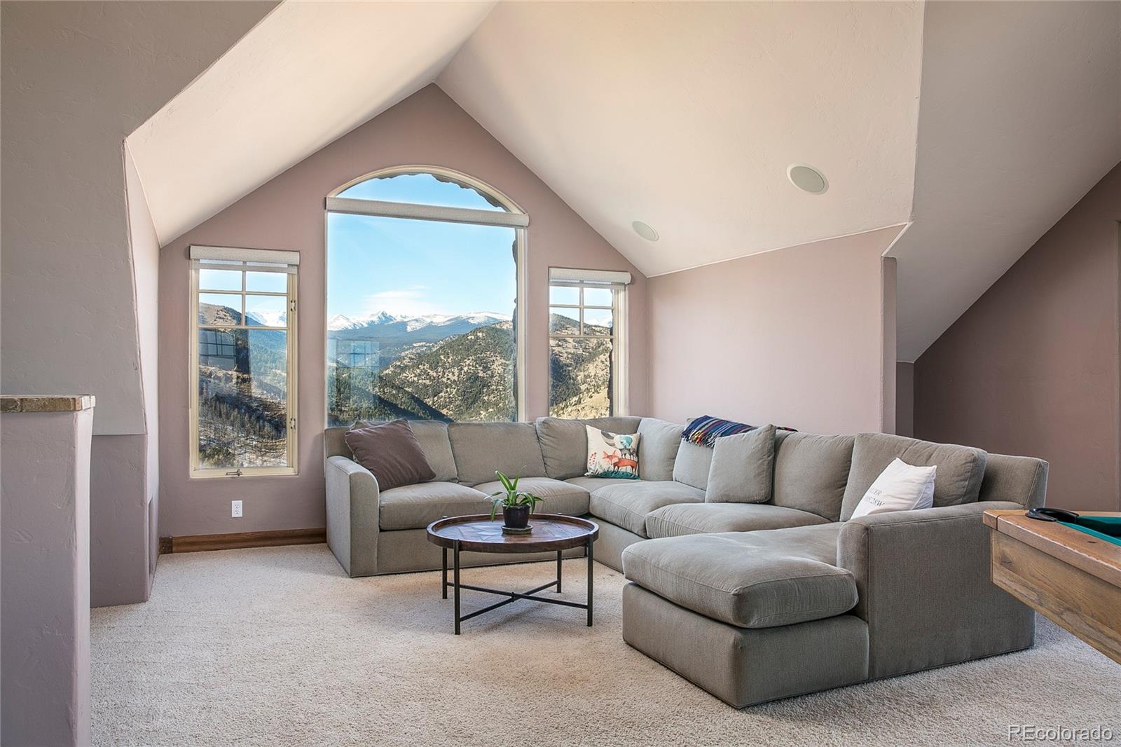 355 Mountain King Road Boulder, CO 80302 - Photo 14 of 33 a living room with furniture and a large window