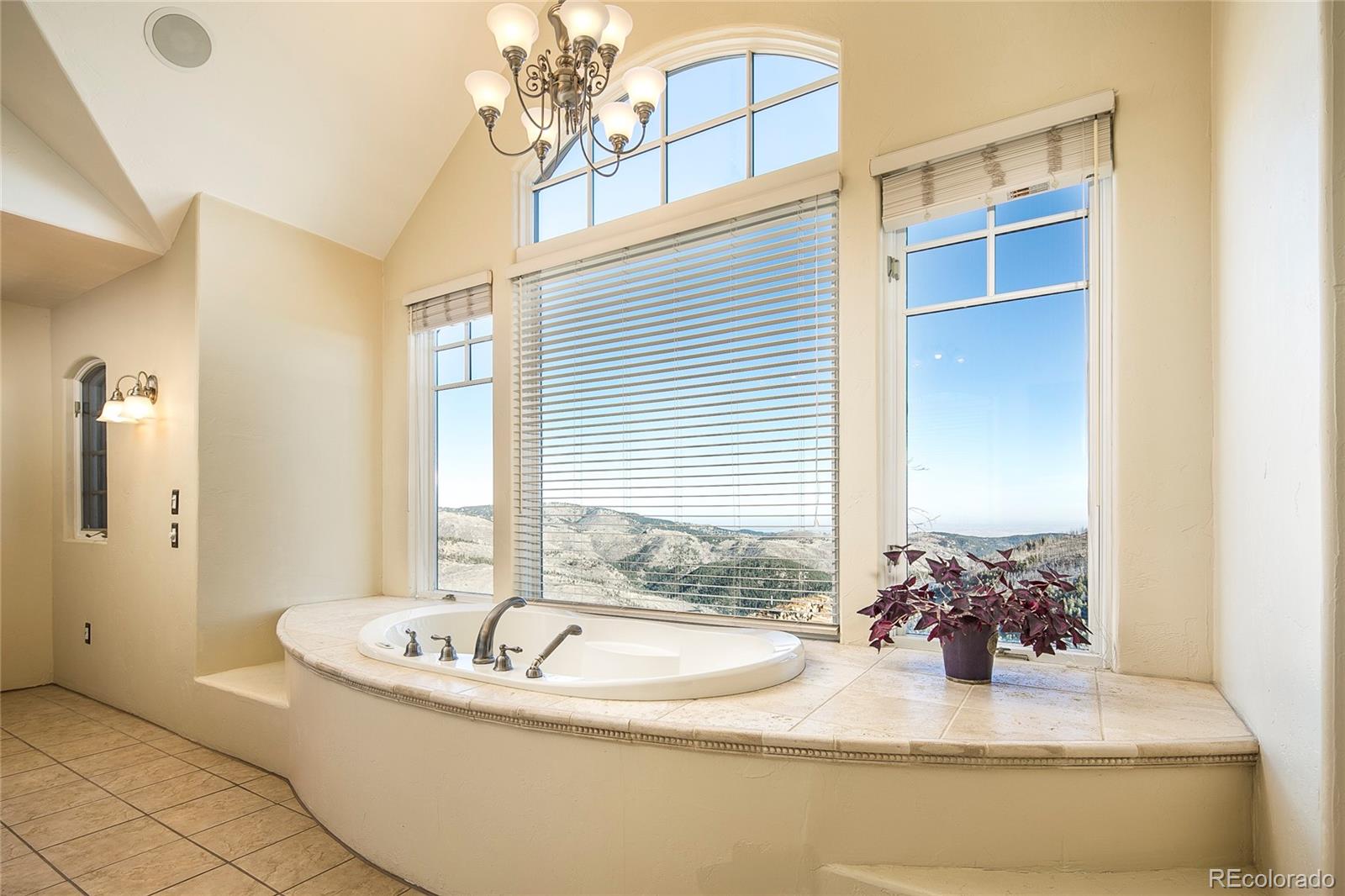 355 Mountain King Road Boulder, CO 80302 - Photo 19 of 33 a bathroom with a granite countertop sink and a mirror