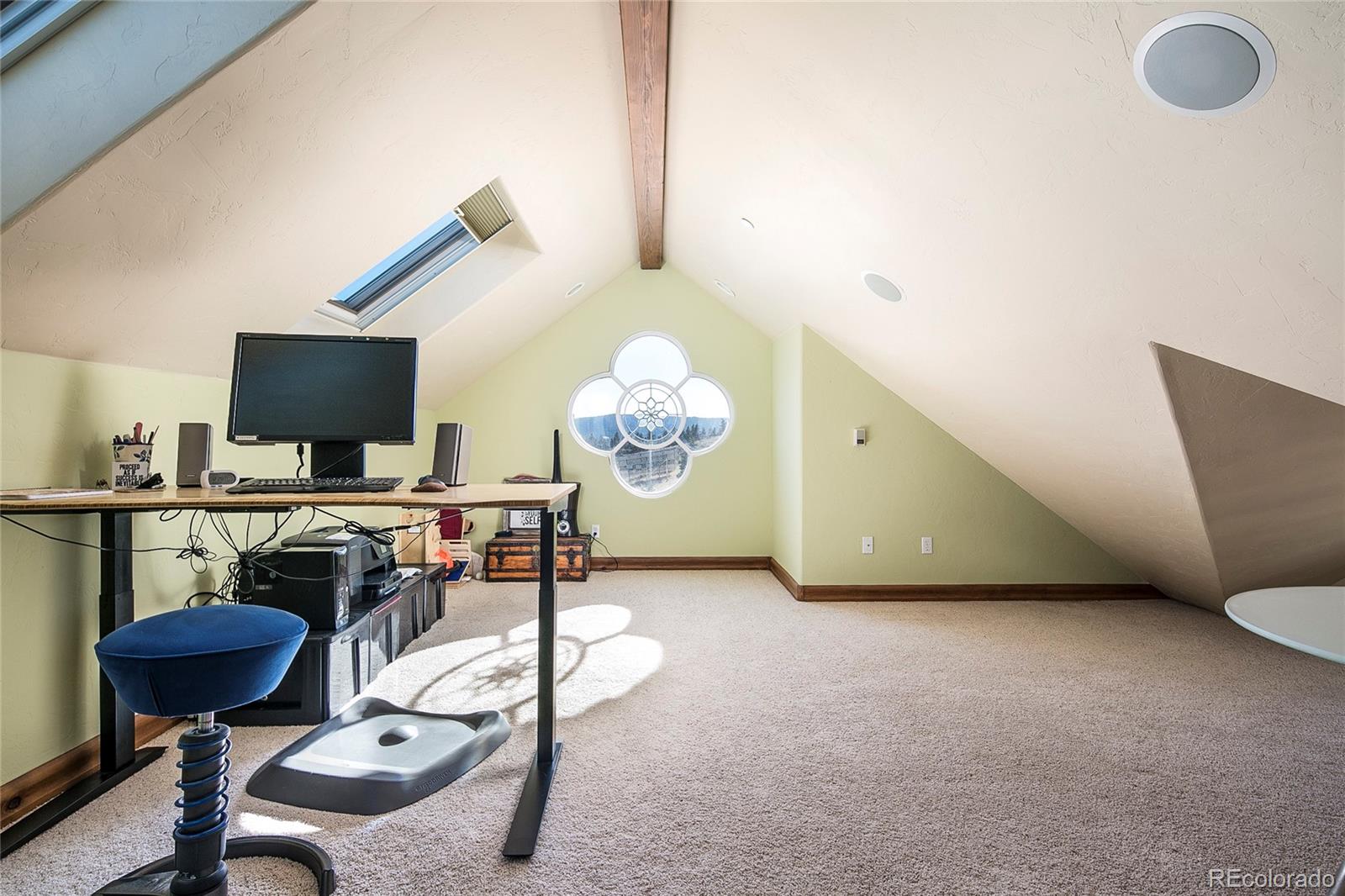 355 Mountain King Road Boulder, CO 80302 - Photo 24 of 33 a living room with furniture and a flat screen tv