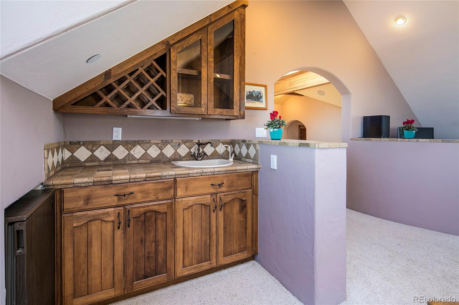 355 Mountain King Road Boulder, CO 80302 - Photo 30 of 33 a kitchen with stainless steel appliances granite countertop a stove and a microwave