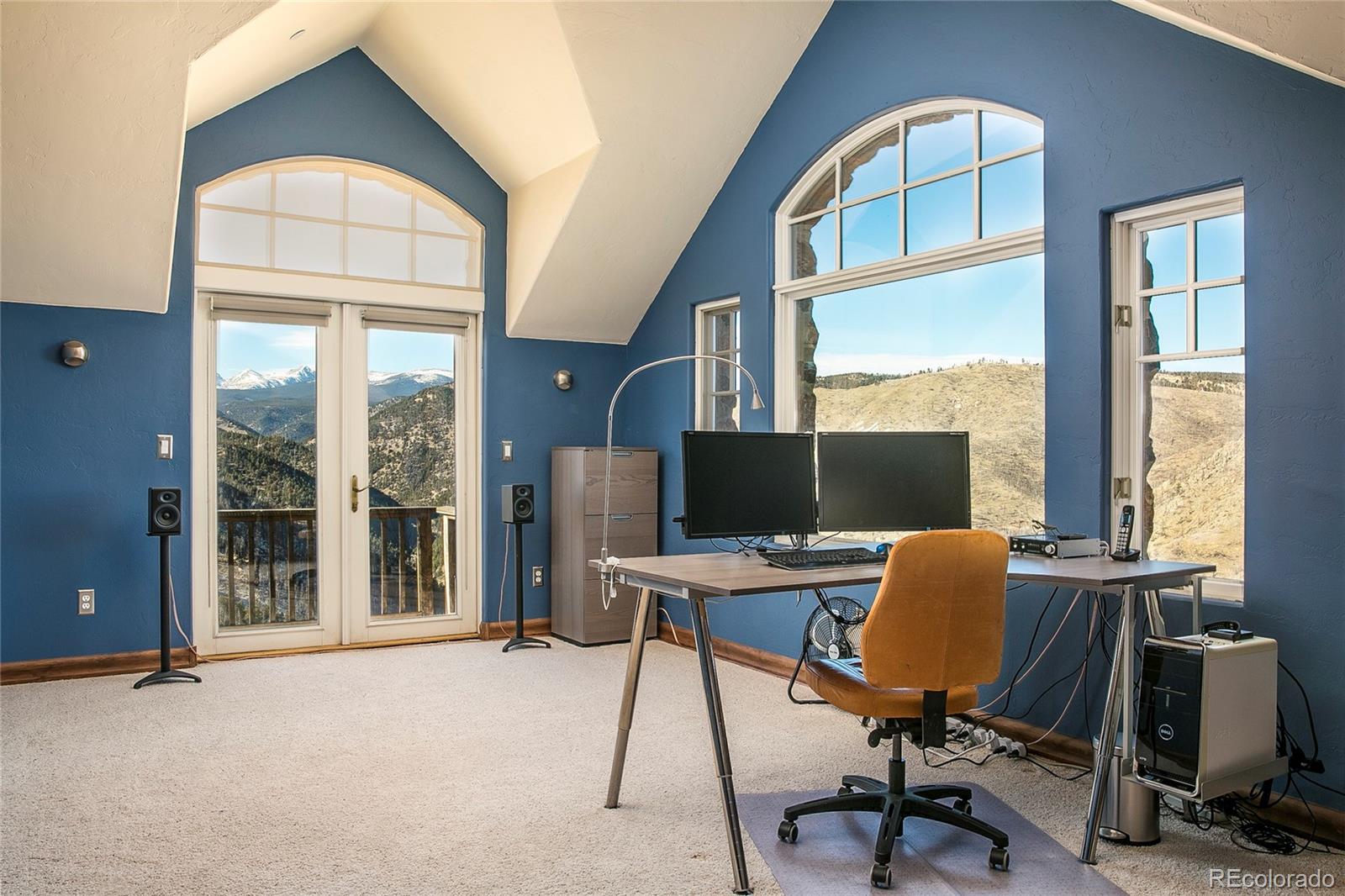 355 Mountain King Road Boulder, CO 80302 - Photo 31 of 33 a view of a workspace with furniture and a window