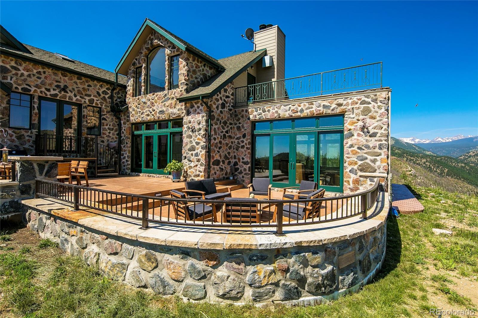 355 Mountain King Road Boulder, CO 80302 - Photo 4 of 33 a view of house with swimming pool outdoor seating