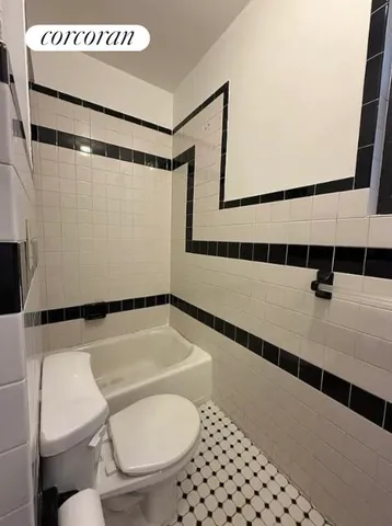 view of a kitchen with a sink and a window