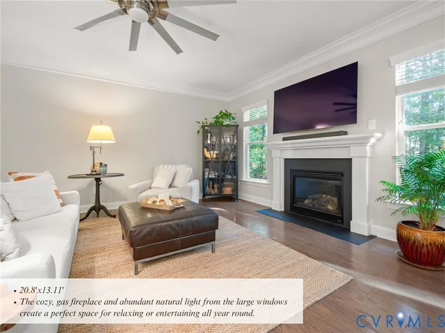 a living room with furniture and a lamp