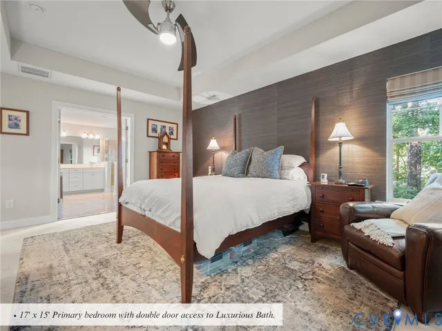a spacious bathroom with a tub a sink shower and mirror