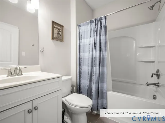 a bathroom with a sink a toilet and a bathtub