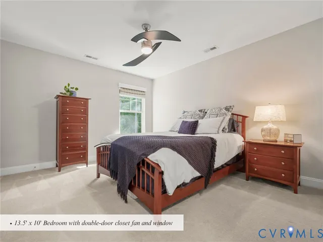 a bedroom with a bed and a cabinets