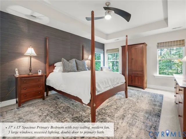 a bed room with a bed and a dresser