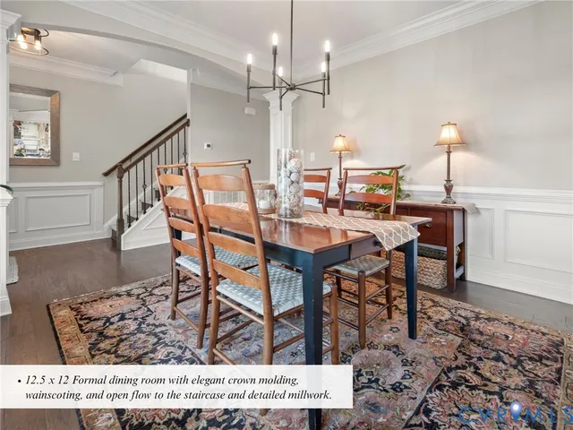 a dining room with a wooden table and chairs