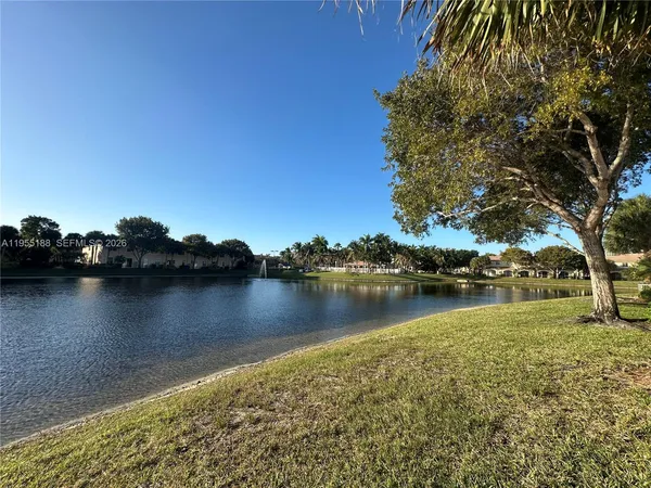 a view of a lake with houses