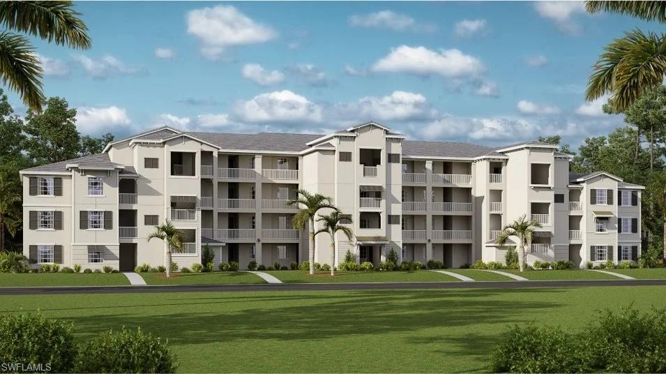 5651 Double Eagle Circle, Unit 4314 Immokalee, FL 34142 - Photo 17 of 41 a front view of a building with a garden