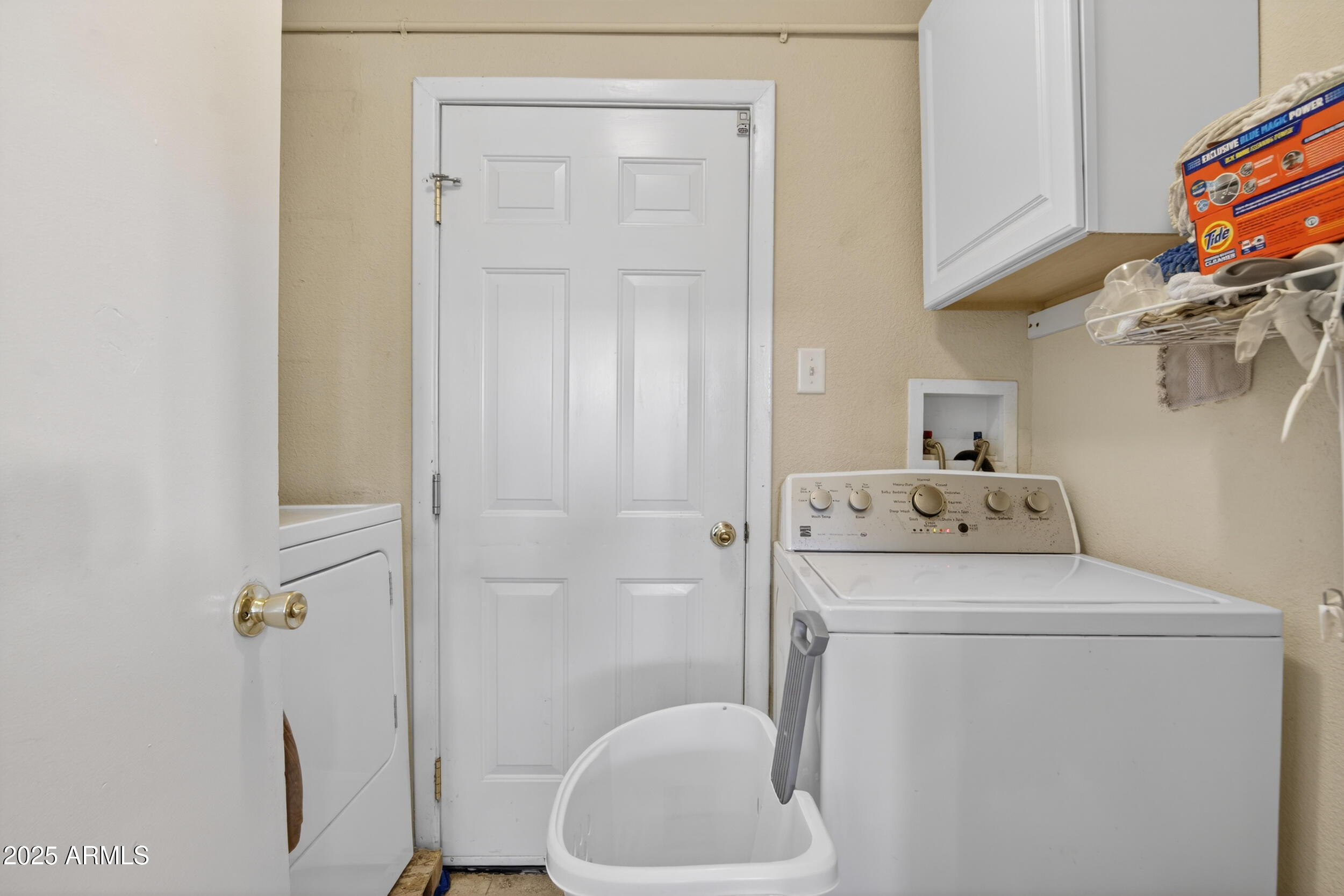 3939 West Cholla Street Phoenix, AZ 85029 - Photo 10 of 11 a bathroom with a sink a toilet and shower