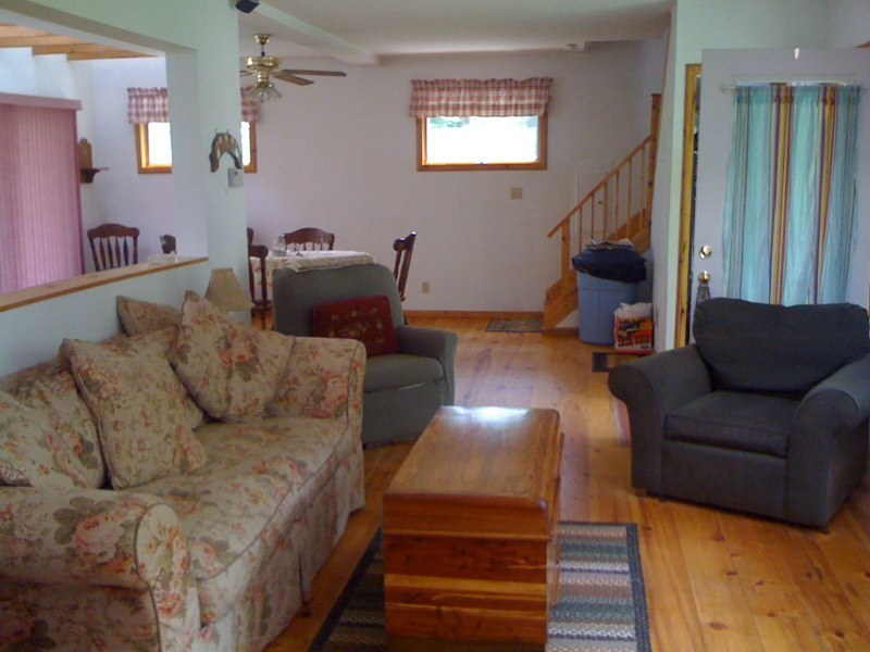 143-151 Rainbow Road Otis, MA 01029 - Photo 17 of 18 a living room with furniture and a window