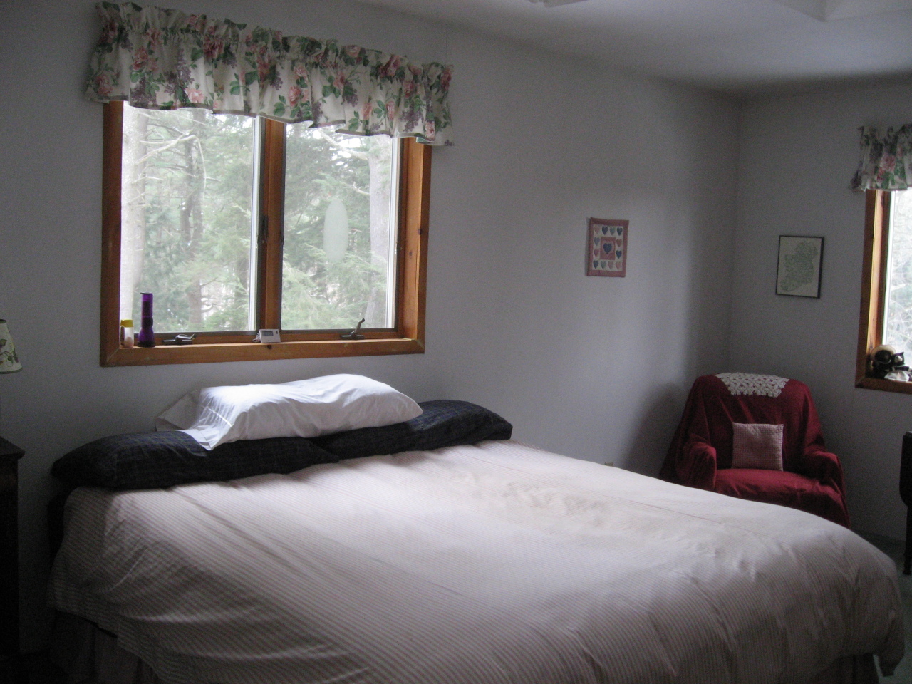 143-151 Rainbow Road Otis, MA 01029 - Photo 18 of 18 a bedroom with a bed and window