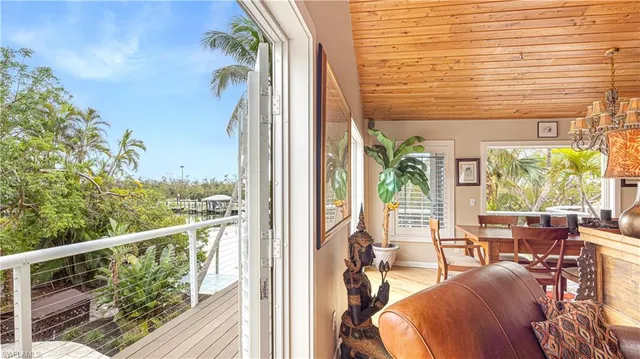 a view of a balcony with chairs