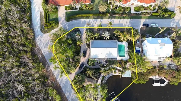 an aerial view of a house with a garden