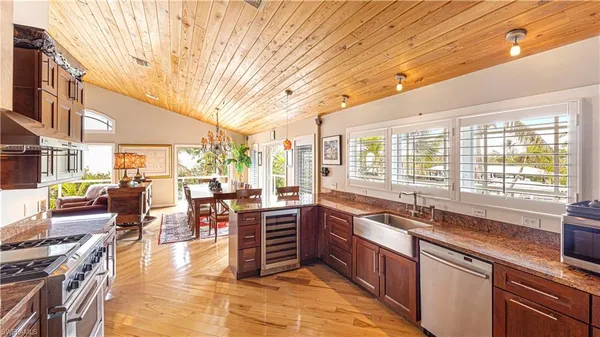 a kitchen with lots of counter top space and dining table