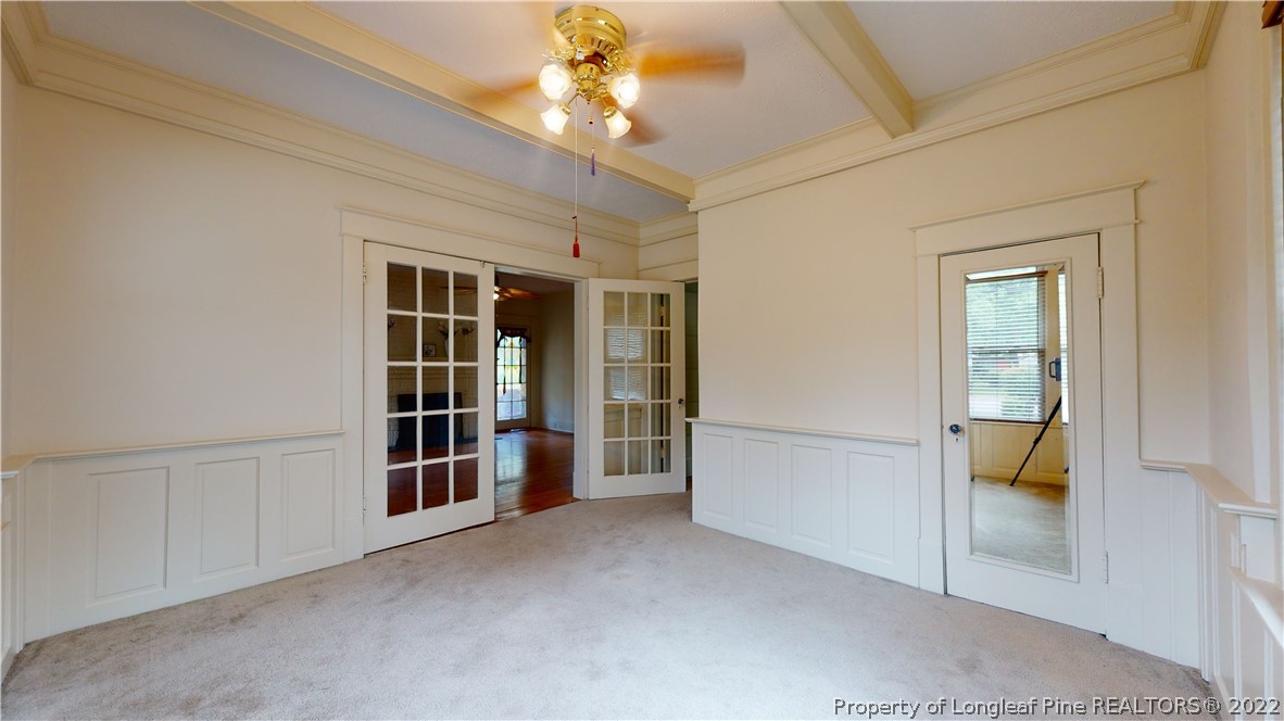 1913 Morganton Road Fayetteville, NC 28305 - Photo 36 of 45 a view of a hallway with windows and chandelier