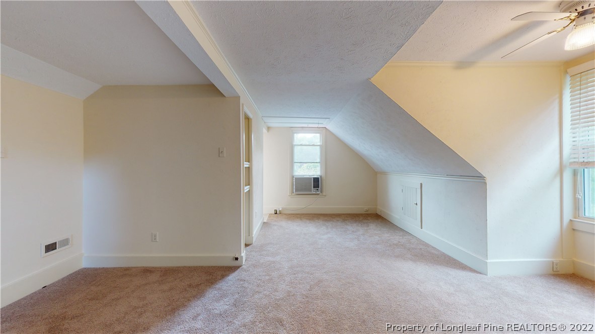 1913 Morganton Road Fayetteville, NC 28305 - Photo 39 of 45 a view of a big room with closet and windows
