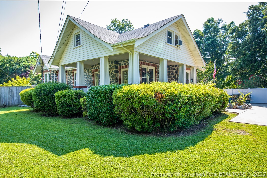1913 Morganton Road Fayetteville, NC 28305 - Photo 10 of 45 a view of a house with a garden