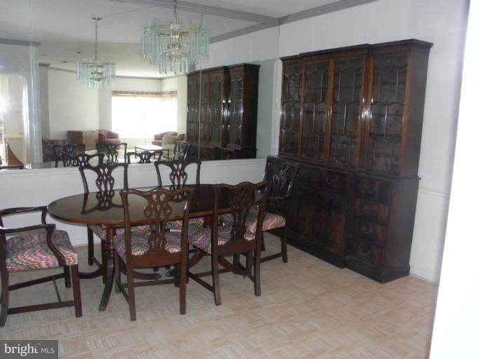 3031 Fallstaff Road, Unit 607C Baltimore, MD 21209 - Photo 3 of 14 a view of a dining room with furniture