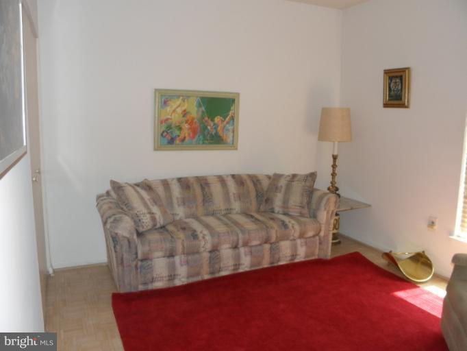 3031 Fallstaff Road, Unit 607C Baltimore, MD 21209 - Photo 8 of 14 a view of livingroom with furniture
