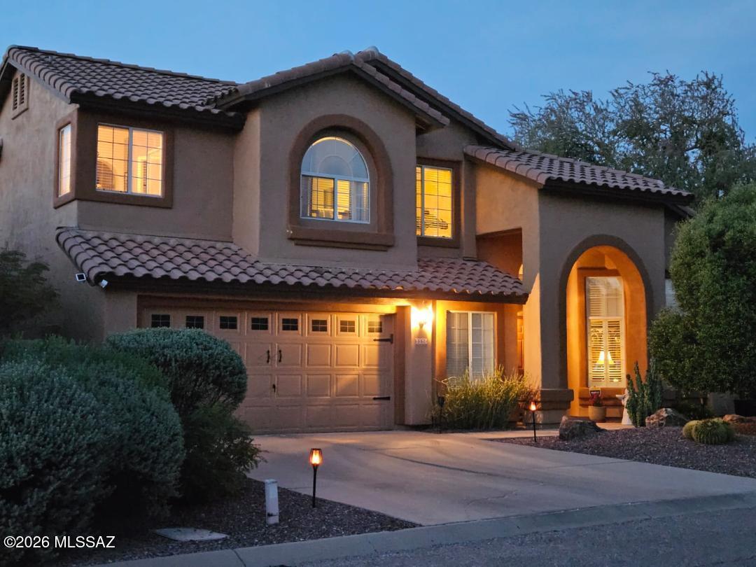 3130 West Star Ranch Trail Tucson, AZ 85742 - Photo 1 of 44 a front view of a house