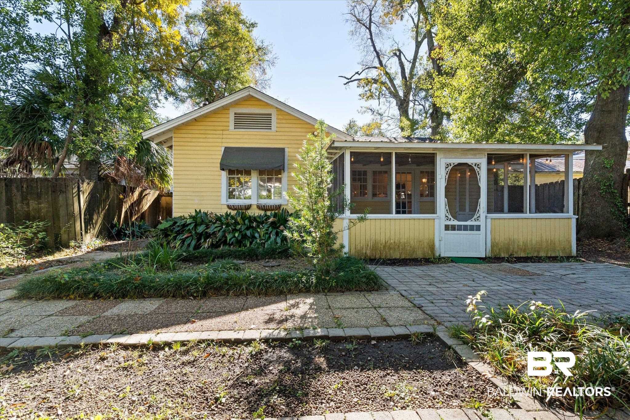 1220 Elmira Street Mobile, AL 36604 - Photo 15 of 20 View of front of property with a patio area and a sunroom