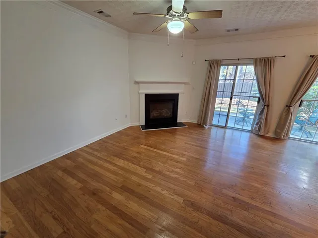 a bathroom with a toilet a sink and a shower