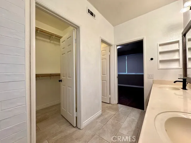 a view of a room with racks on the wall