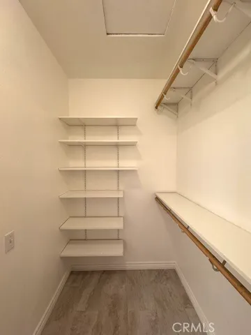 a view of an empty room with a garage