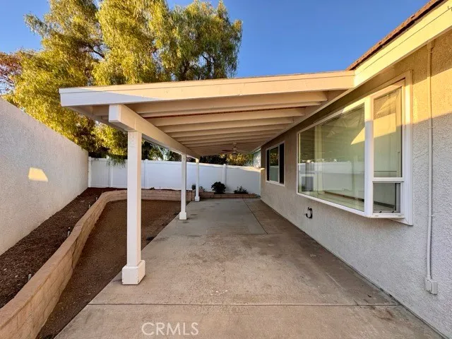 a view of an empty room with a balcony